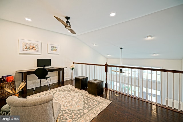 office space with dark hardwood / wood-style flooring, ceiling fan, and lofted ceiling