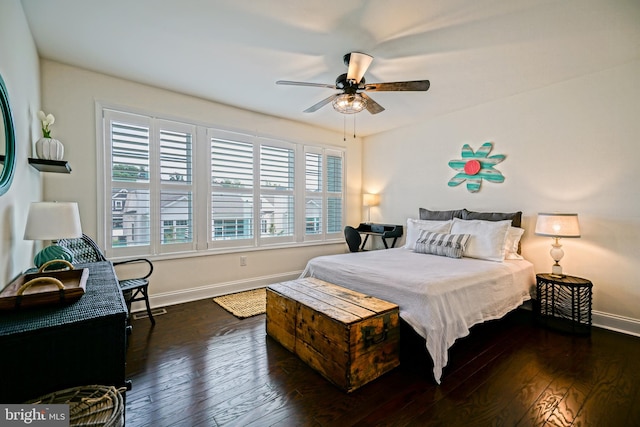 bedroom featuring dark hardwood / wood-style flooring and ceiling fan