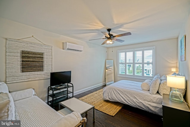 bedroom with an AC wall unit, hardwood / wood-style floors, and ceiling fan