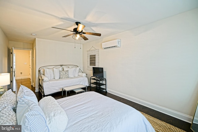 bedroom featuring a wall mounted AC, ceiling fan, and dark hardwood / wood-style floors