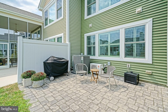 view of patio / terrace with area for grilling and central AC