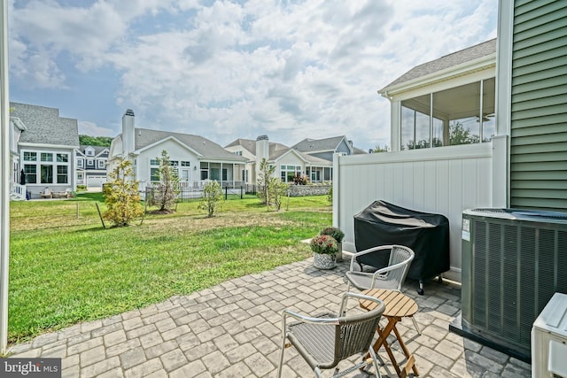 view of patio with central AC