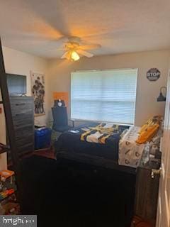 bedroom featuring ceiling fan