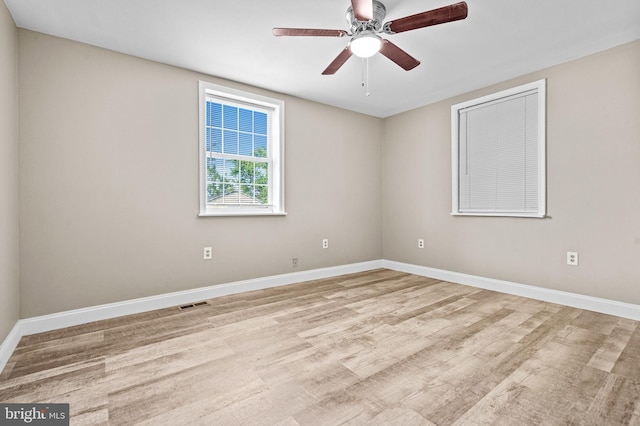 unfurnished room featuring ceiling fan and light hardwood / wood-style flooring