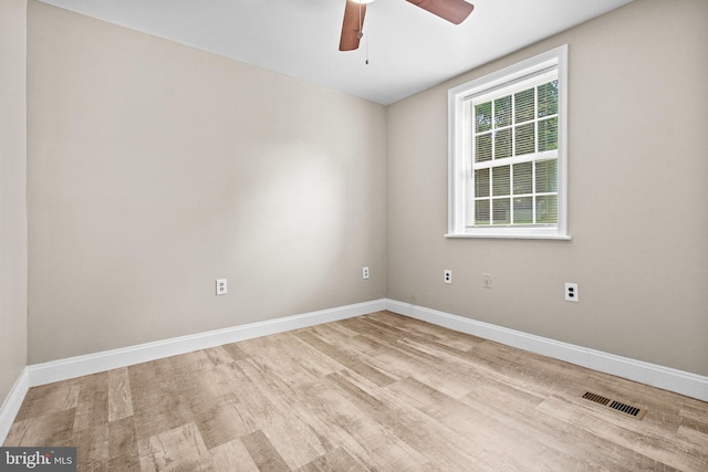 unfurnished room featuring light hardwood / wood-style floors and ceiling fan