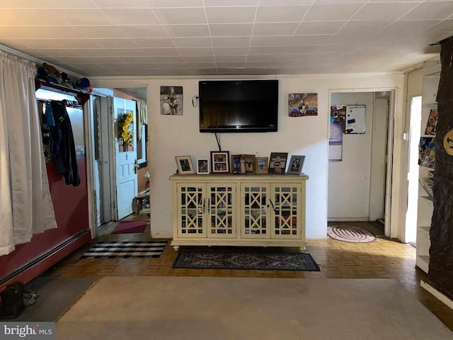 living room with a baseboard radiator