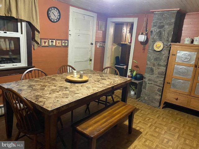 dining room featuring light parquet floors