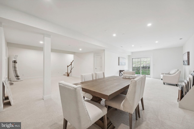 view of carpeted dining space