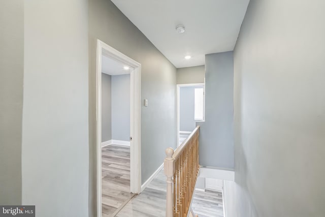 hall with light hardwood / wood-style flooring