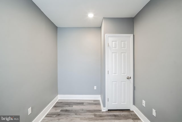 spare room with light hardwood / wood-style floors