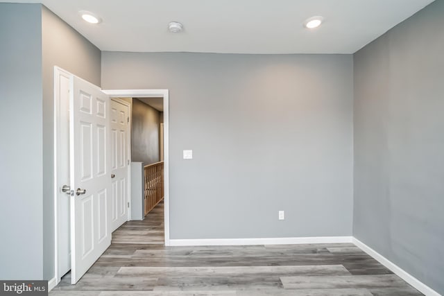 unfurnished room featuring light hardwood / wood-style flooring