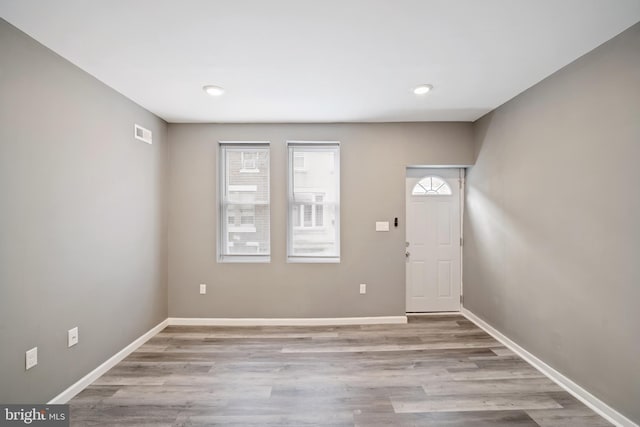 entrance foyer with light hardwood / wood-style floors