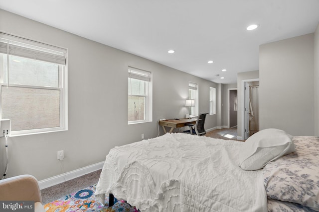 bedroom with light colored carpet