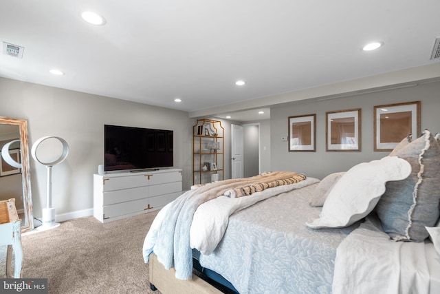 bedroom featuring light colored carpet