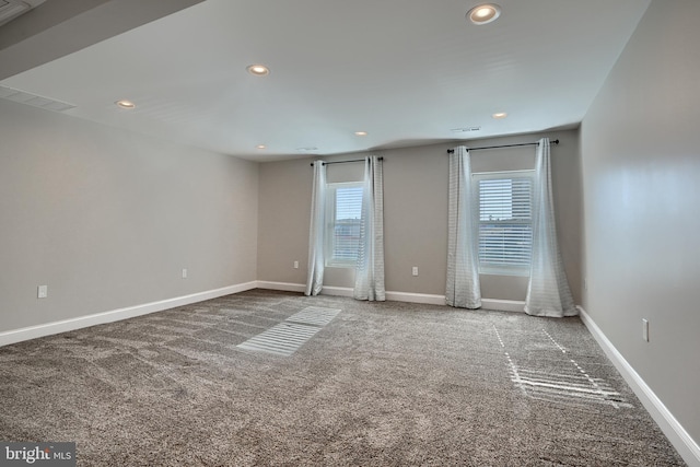 spare room featuring carpet floors