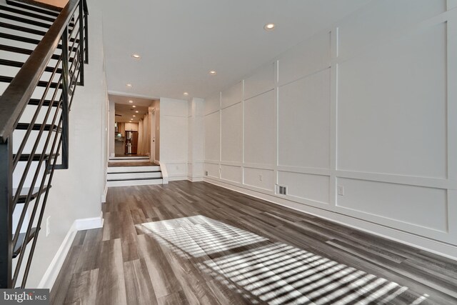 dining area featuring dark wood-type flooring