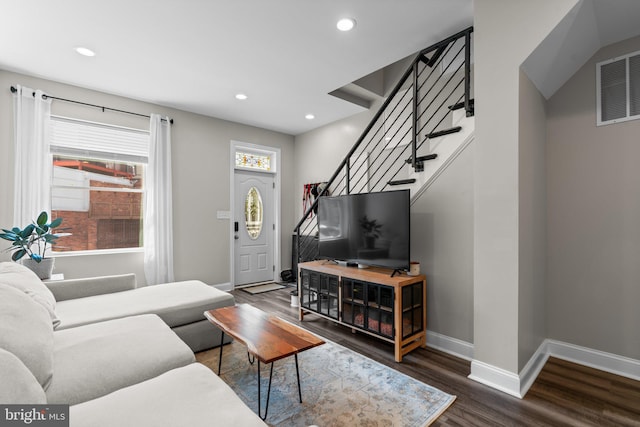 living room featuring dark hardwood / wood-style floors