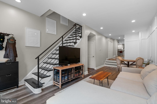 living room with dark wood-type flooring