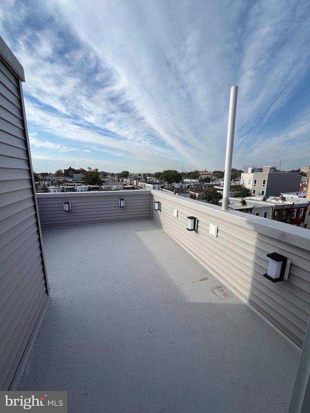 view of patio / terrace with a balcony