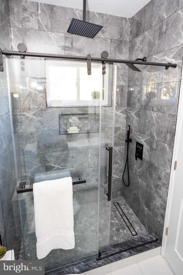 bathroom with an enclosed shower