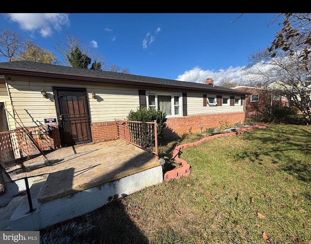 exterior space featuring a lawn