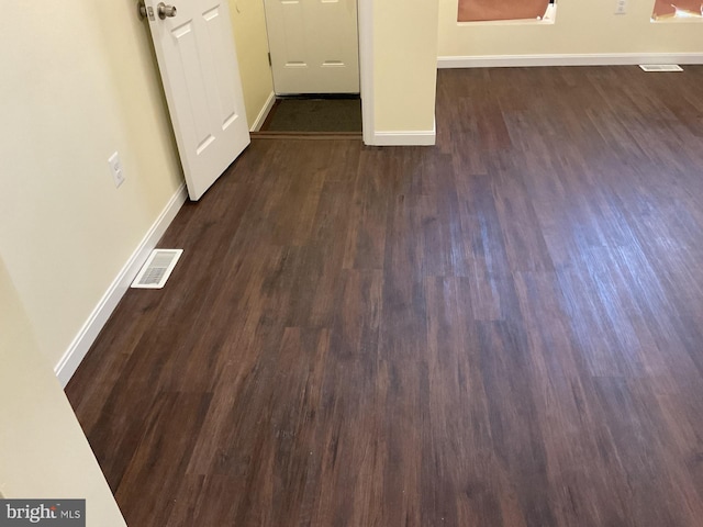 interior space featuring dark wood-type flooring