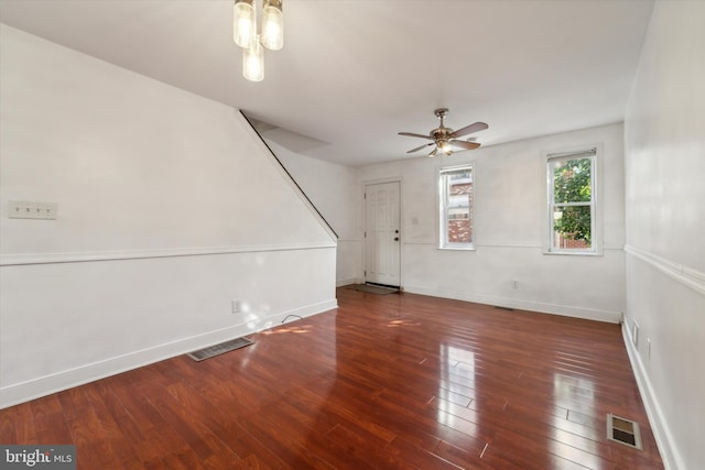 empty room featuring ceiling fan and wood-type flooring