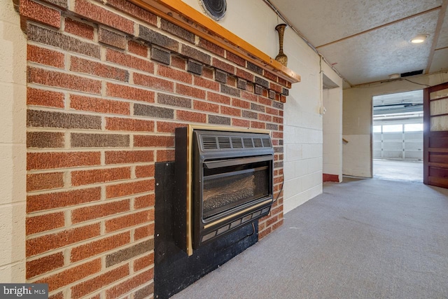 interior details featuring heating unit, a wood stove, and carpet