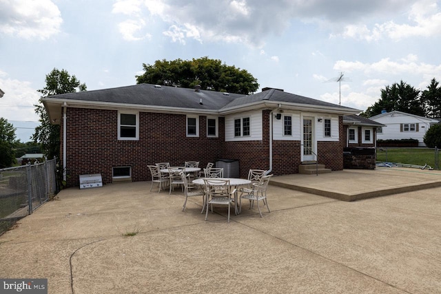 rear view of house featuring a patio