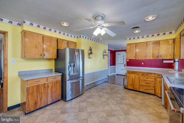 kitchen with dishwashing machine, a baseboard radiator, light tile patterned flooring, ceiling fan, and stainless steel refrigerator with ice dispenser