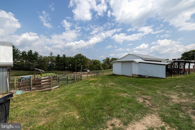 view of yard with an outdoor structure