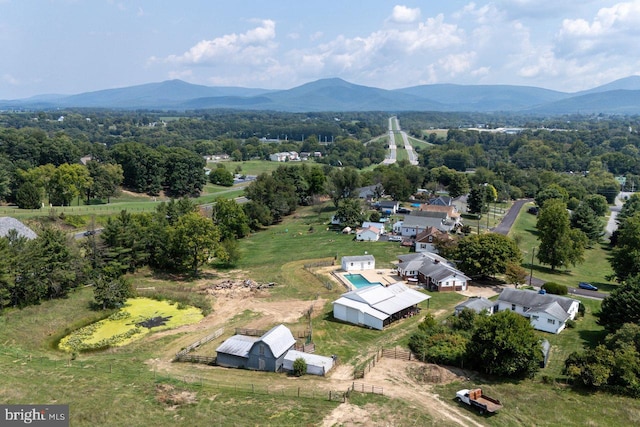 drone / aerial view featuring a mountain view