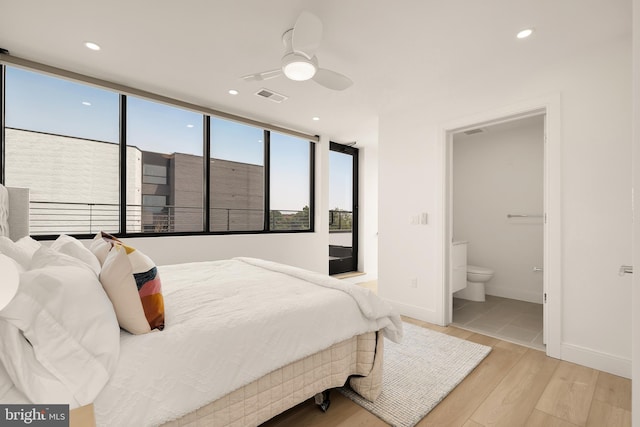 bedroom with connected bathroom, recessed lighting, visible vents, baseboards, and light wood-style floors