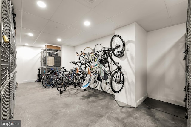 garage with recessed lighting, bike storage, and baseboards