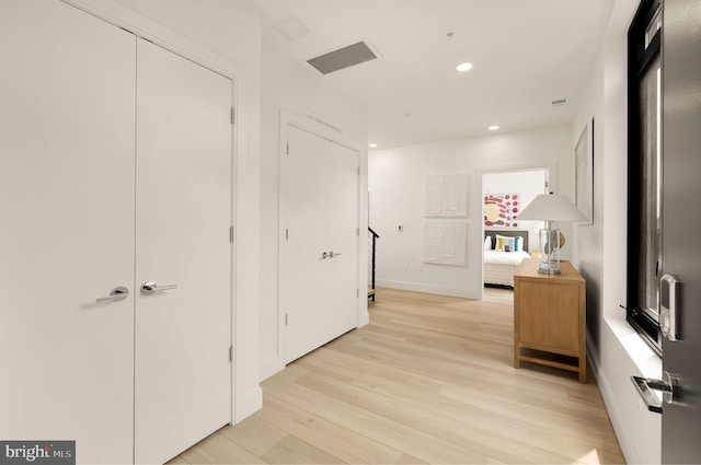 hall featuring light hardwood / wood-style flooring