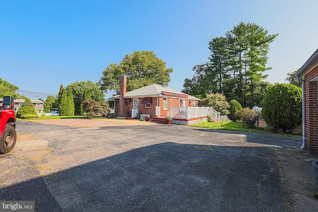 exterior space featuring a wooden deck