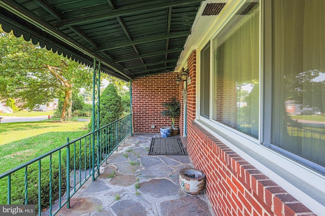 view of patio featuring covered porch