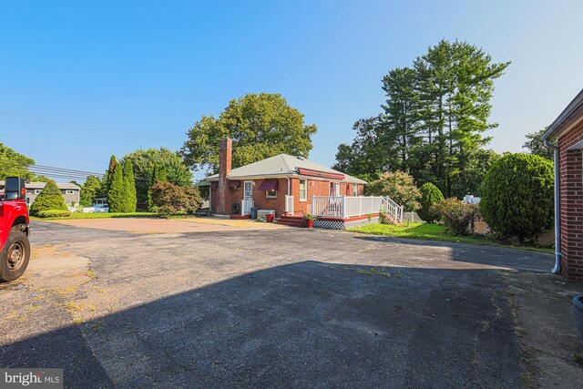 exterior space with a wooden deck