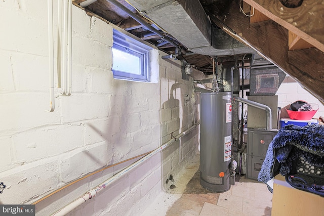 utility room with gas water heater