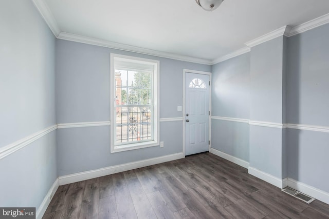 interior space featuring ornamental molding and wood-type flooring