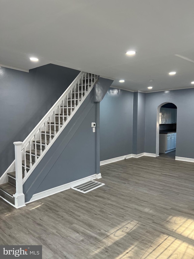 basement featuring dark hardwood / wood-style floors