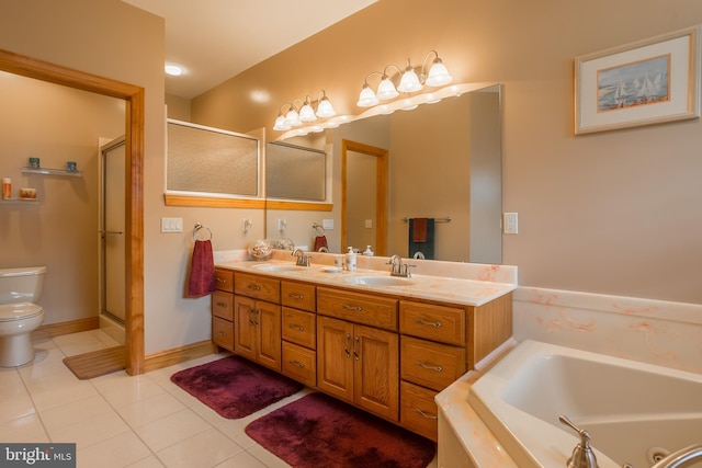 full bath with a sink, a garden tub, tile patterned flooring, and a stall shower