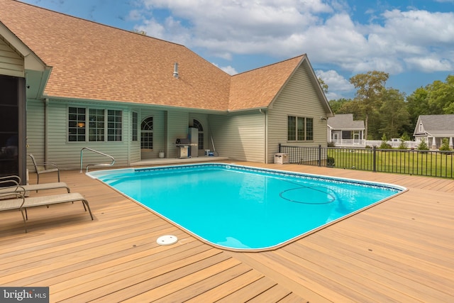 view of pool featuring a wooden deck