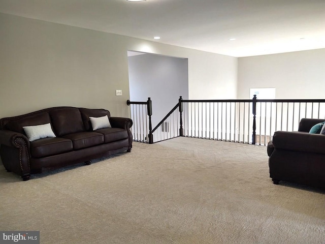 living room with recessed lighting and carpet