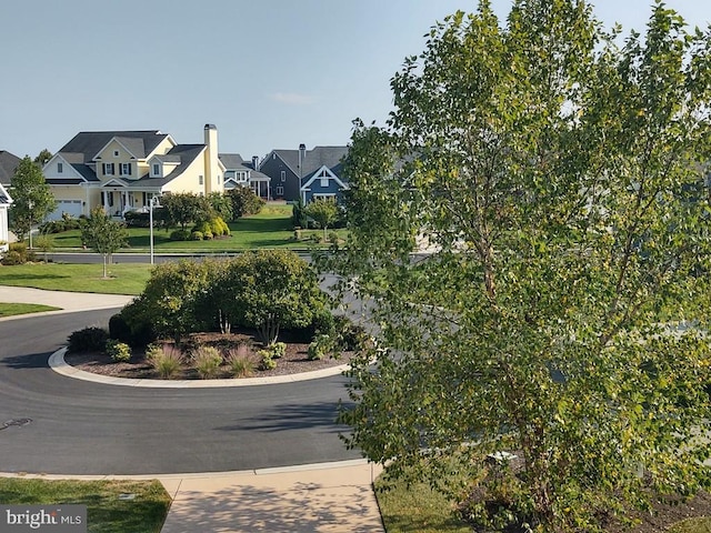 view of road with a residential view