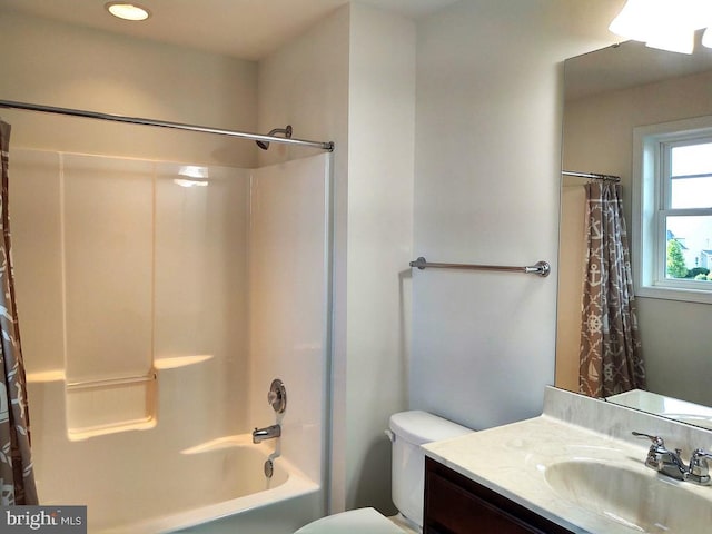 full bathroom featuring shower / tub combo, toilet, and vanity