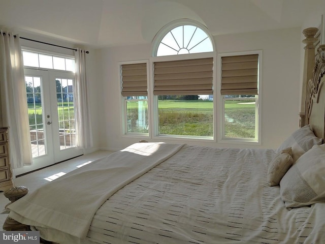 bedroom featuring access to outside and french doors