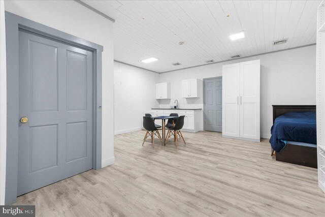 dining area featuring light wood-type flooring