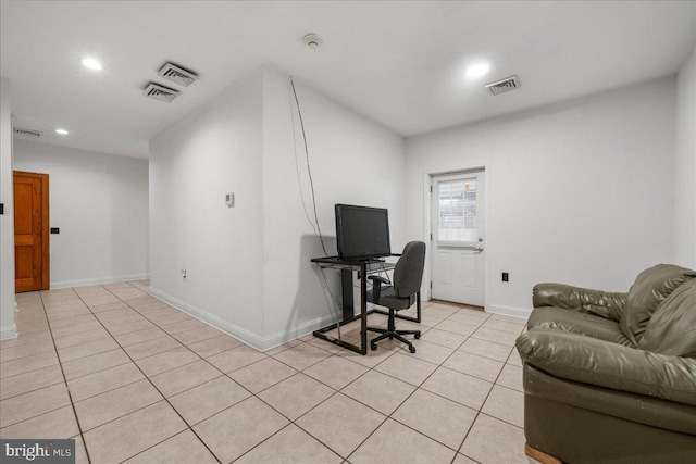 office space featuring light tile patterned floors, visible vents, recessed lighting, and baseboards