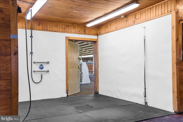 interior space featuring wooden ceiling